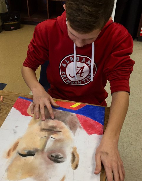 Students Craft Larger Than Life Candy Superhero Portraits