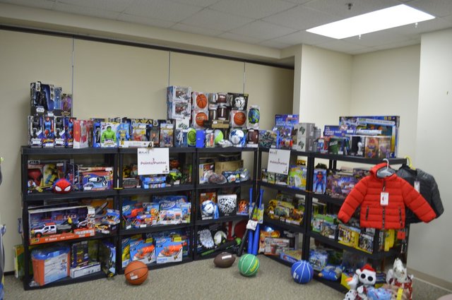 Here’s how many kids received gifts at The Place’s Holiday House this year