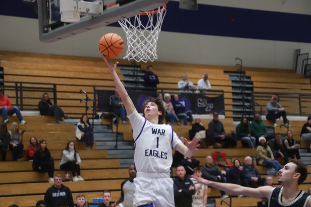 Basketball: War Eagles complete comeback against Wolverines