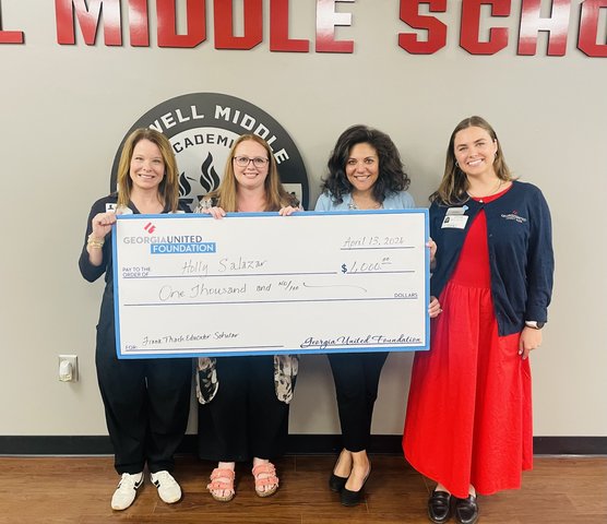 A Forsyth County teacher just earned a scholarship to continue her own education